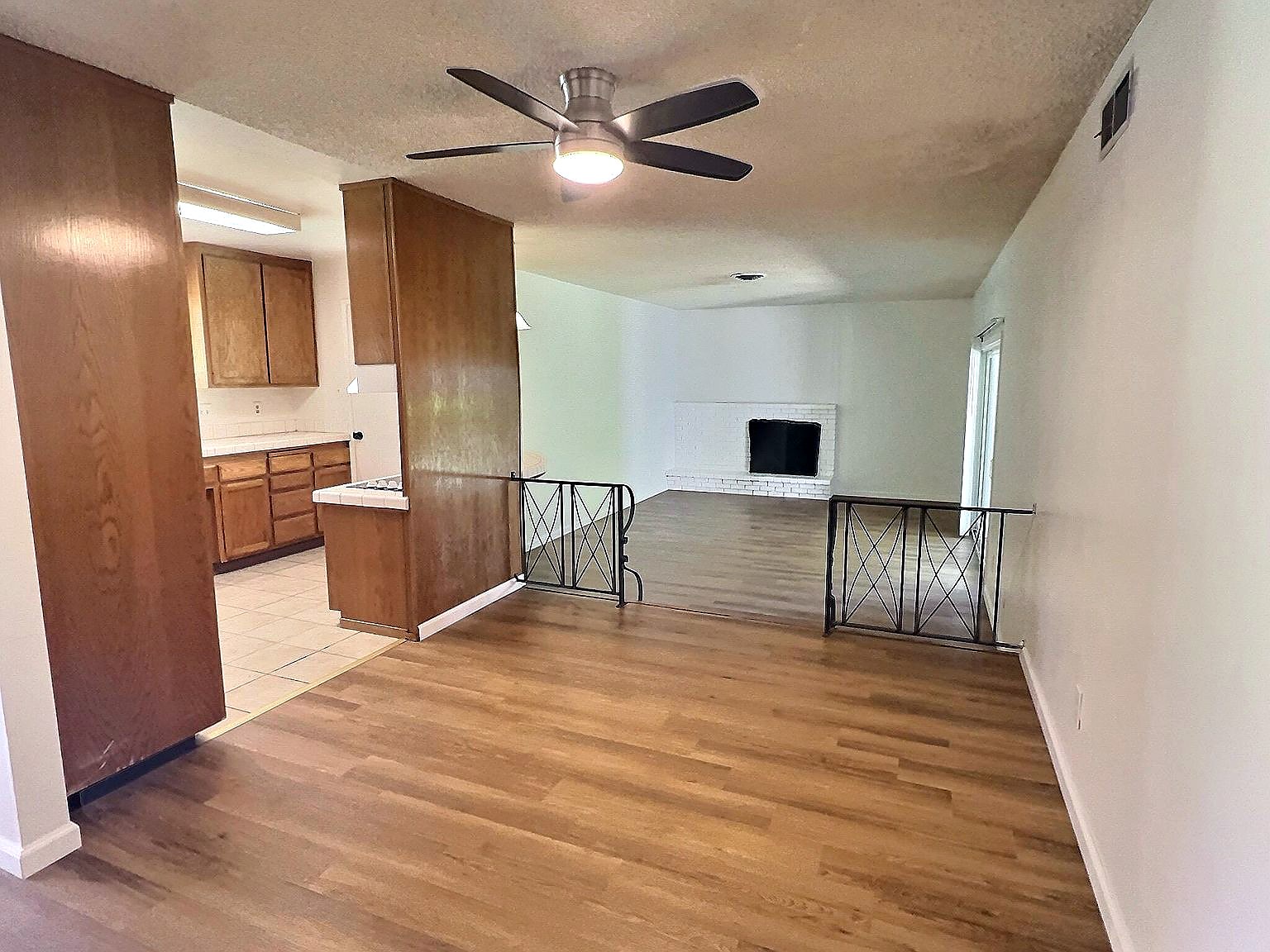 Family room with fireplace at this Notre Dame residence